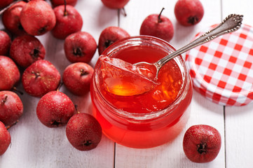 Jar with teaspoon jelly hawthorn
