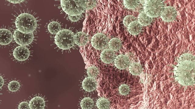 An animation of viruses rapidly attacking a cell