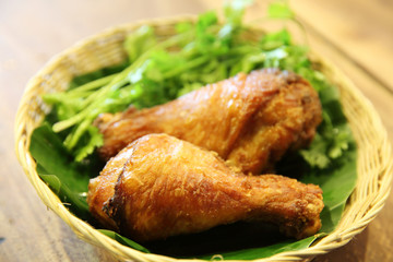 Fried chicken on wood background