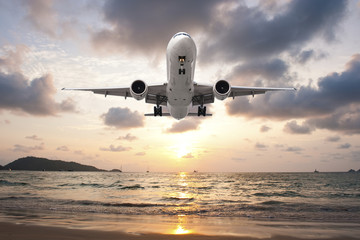 Airplane Landing in sunset