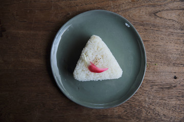 Thai rice on wood background