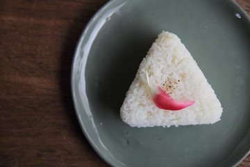Thai rice on wood background