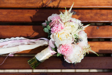 Bridal bouquet on the bench