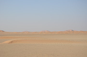 Sand dune on plane desert Dubai
