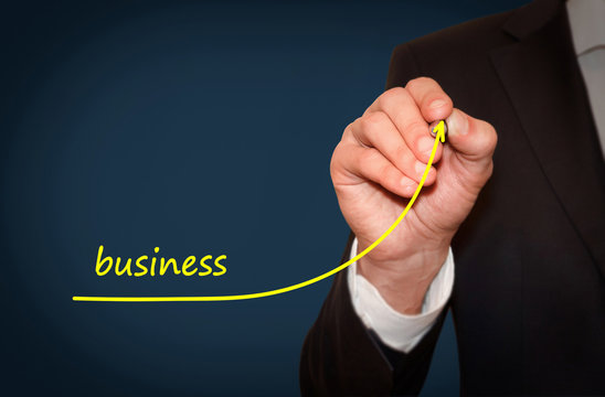 Businessman Drawing  Increase Business Graph, Motivation Concept. Business Plan To Accelerate Business Growth.
