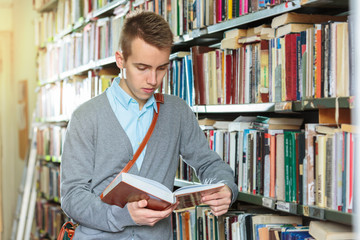 Young student reading in the library
