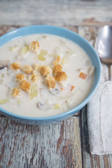 Creamy Mushroom Soup on a wooden background