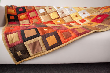 Patchwork quilt. Part of patchwork quilt as background. Handmade. Klimt print.