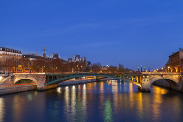 Seine river at night in Paris, France.