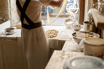 Baker is making a cake