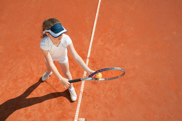 Young tennis champion preparing to serve