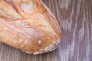Bread on wooden background 