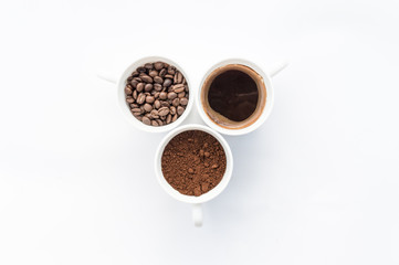 Three cups of different stages of preparing coffee