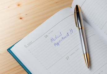 Daily planner with the entry Medical appointment