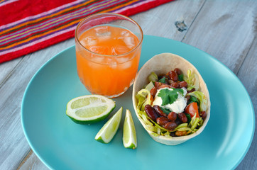 Mexican food Taco boat Tortilla served with Margarita and lime