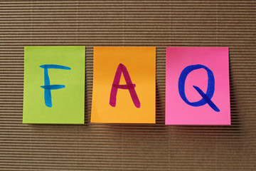 FAQ (Frequently Asked Questions) acronym on colorful sticky note