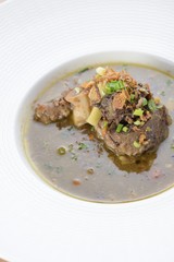 Oxtail Soup on a white bowl