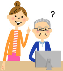 高齢者にパソコンを教える女性