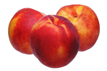 beautiful ripe peaches isolated on white background
