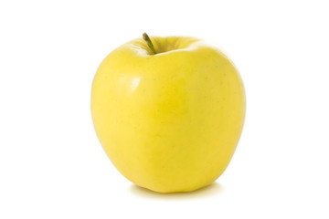 Single fresh yellow apple isolated on white background.