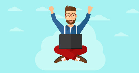 Man sitting on cloud with laptop.