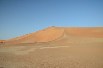 Fototapeta na wymiar Sand dune hill in Oman