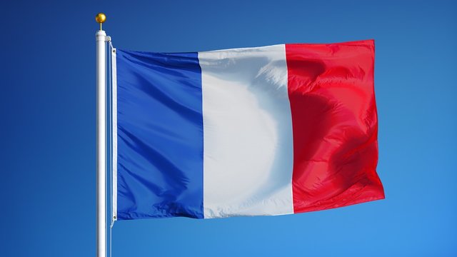 France flag waving in slow motion against clean blue sky, seamlessly looped, close up, isolated on alpha channel with black and white luminance matte, perfect for film, news, digital composition