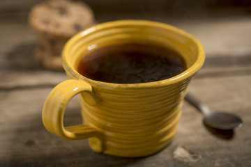 Yellow Cup Containing Warm Coffee or Tea