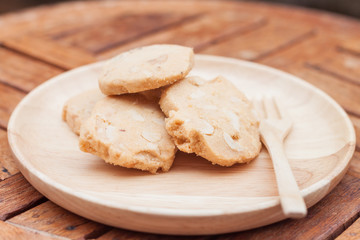 Cashew cookies on wooden plate