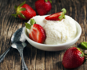 Vanilla ice cream and strawberries.