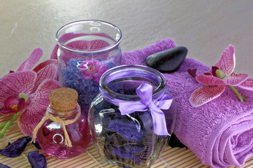Spa treatment setting with purple theme