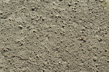 Old asphalt gray color close-up.