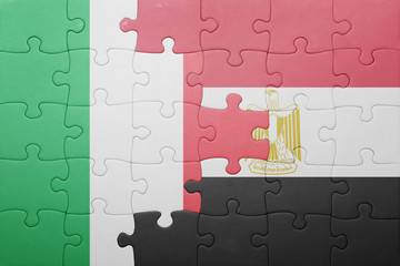 puzzle with the national flag of italy and egypt