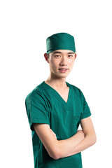 isolated asian young man doctor in green on white background
