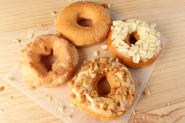 Donuts on wooden background