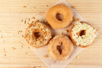 Donuts on wooden background