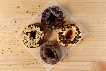 Donuts on wooden background