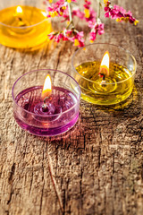 Vertical candle image on wooden background
