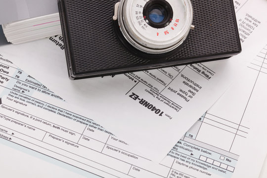 Camera on tax form background