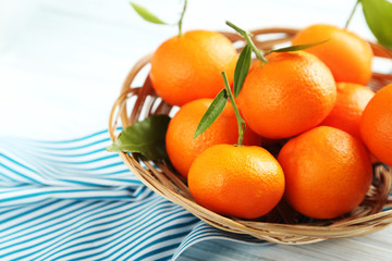 Ripe mandarin on a blue wooden table