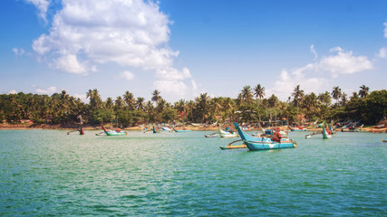 Fototapeta na wymiar Traditional Sri Lankan Fishing Boats near Mirissa, Sri Lanka