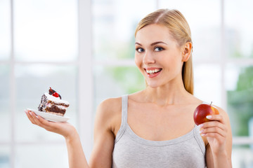 Young woman with chocolate cake