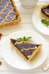 Chocolate tart with peanut butter.