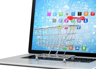 Shopping cart on laptop. 