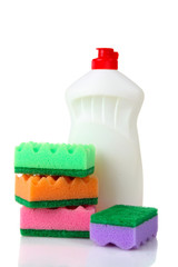 detergent and plenty of sponges for washing dishes isolated on white background