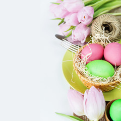 Basket with Easter eggs  and flowers