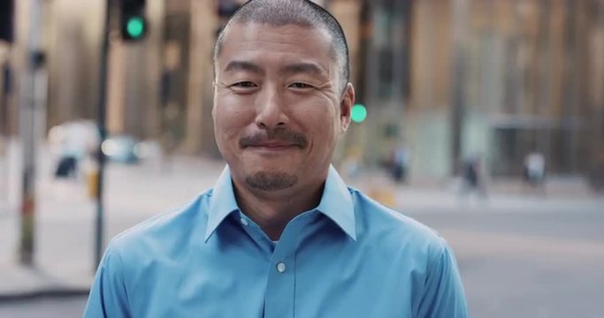 Slow Motion Portrait of Japanese businessman smiling