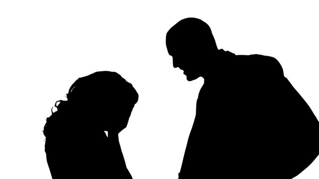 Silhouette of couple on a white background.