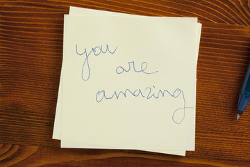 Sticky note with text you are amazing