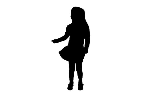 Silhouette of a girl who dances.